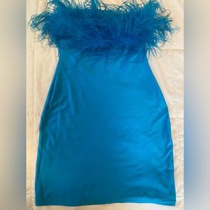 Feather dress by the King of Style